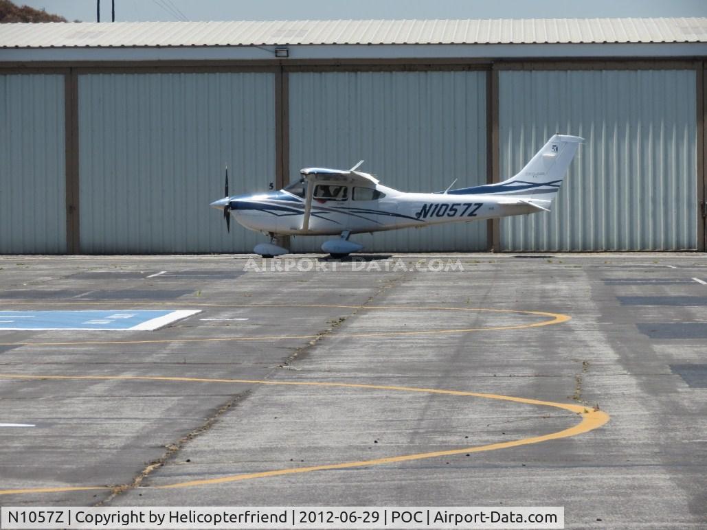 N1057Z, 2007 Cessna T182T Turbo Skylane C/N T18208795, Taxiing southbound next to Ranger Row
