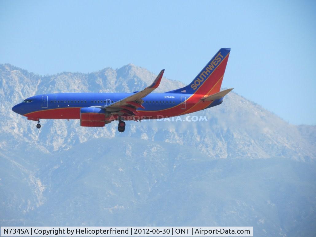N734SA, 1999 Boeing 737-7H4 C/N 27866, On final for 26R