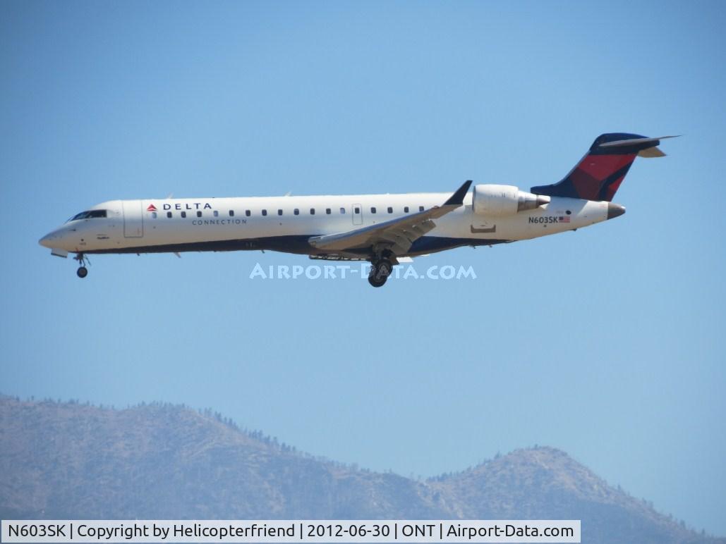 N603SK, 2006 Bombardier CRJ-702 (CL-600-2C10) Regional Jet C/N 10248, On final 26R