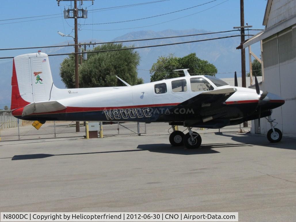 N800DC, 1956 Beech D50 Twin Bonanza C/N DH-120, Parked at a hanger on the northside