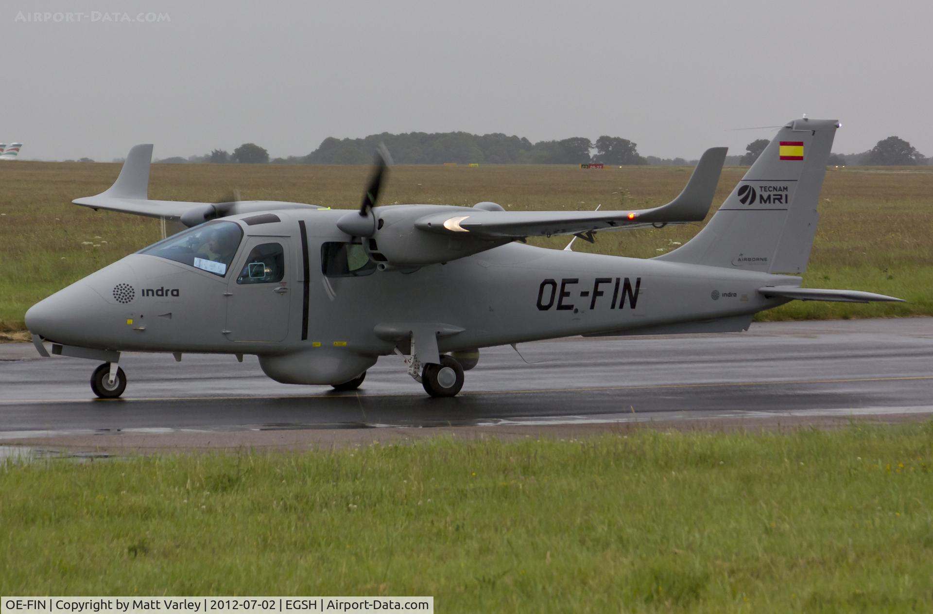 OE-FIN, 2011 Tecnam P-2006T C/N 085, Arriving at a wet SaxonAir.