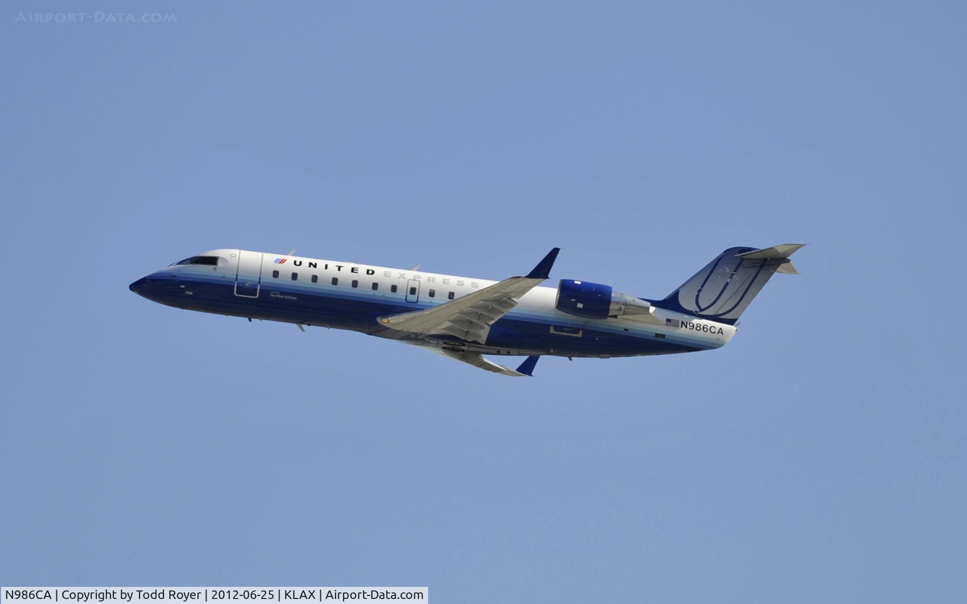 N986CA, Canadair CRJ-100ER (CL-600-2B19) C/N 7174, Departing LAX on 25R