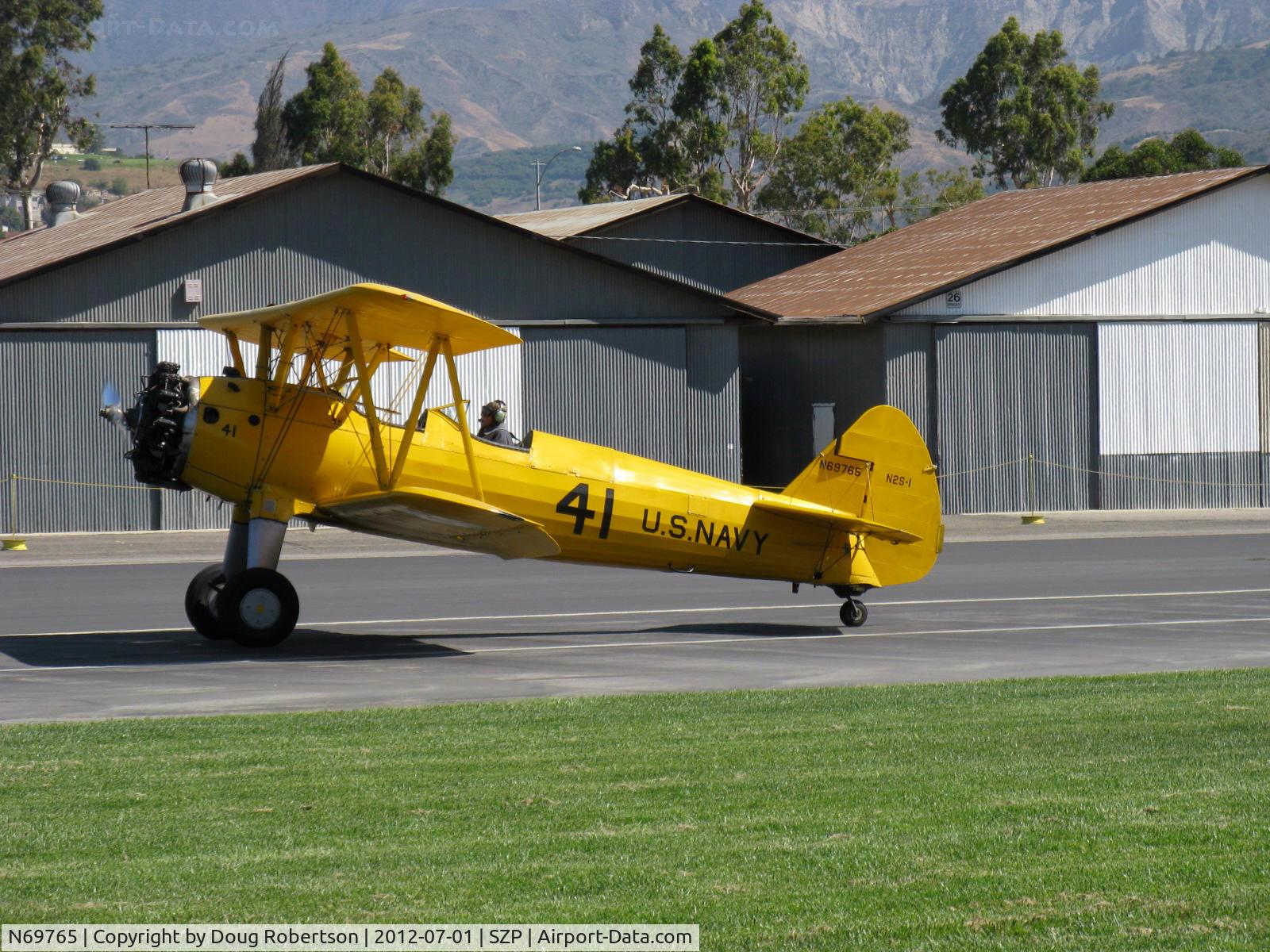 N69765, 1941 Boeing A75N1 (PT17) C/N 75-1044, 1941 Boeing Stearman A75N1 as Navy N2S1, Continental W670 220 Hp, landing roll Rwy 22