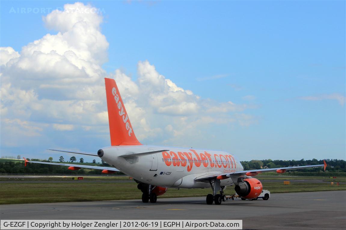 G-EZGF, 2011 Airbus A319-111 C/N 4635, Push back ceremony on apron.....