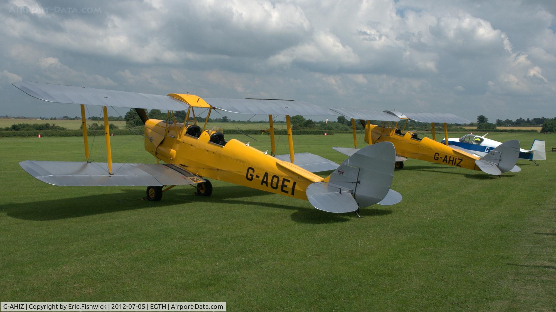 G-AHIZ, 1944 De Havilland DH-82A Tiger Moth II C/N 4610, 5. A pair of pristine Moths at Shuttleworth (Old Warden) Aerodrome.