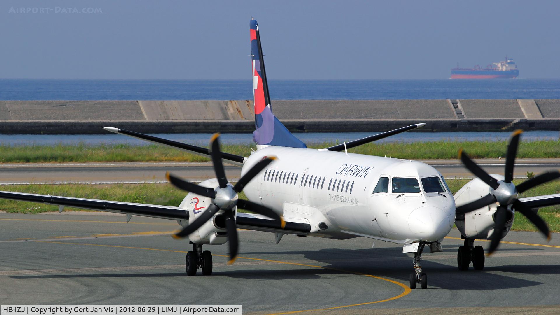 HB-IZJ, 1995 Saab 2000 C/N 2000-015, Just left the runway at Genua