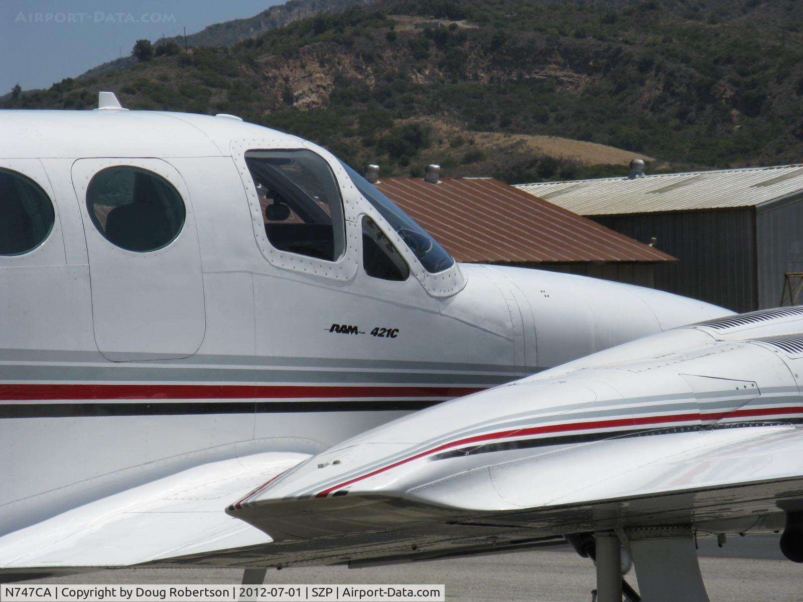 N747CA, Cessna 421C Golden Eagle C/N 421C0850, 1980 Cessna 421C GOLDEN EAGLE, Continental GTSIO-520-L & -N counter-rotating geared engines upgrade conversion by RAM Aircraft LP, 375 Hp ea. Pressurized. 223 ktas cruise at 20K, logo