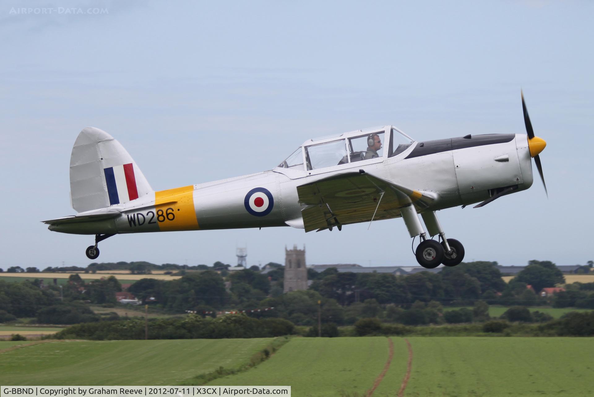 G-BBND, 1950 De Havilland DHC-1 Chipmunk T.10 C/N C1/0225, Just taken off from Northrepps.