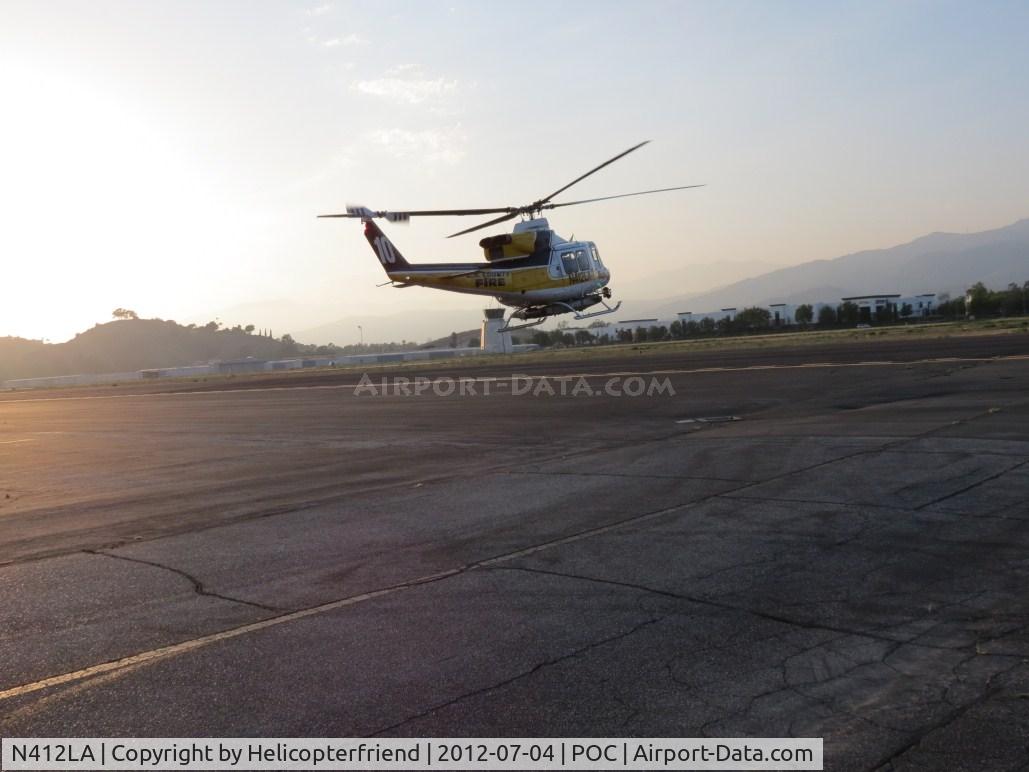 N412LA, 1981 Bell 412 C/N 33061, Turning westbound on taxiway Sierra