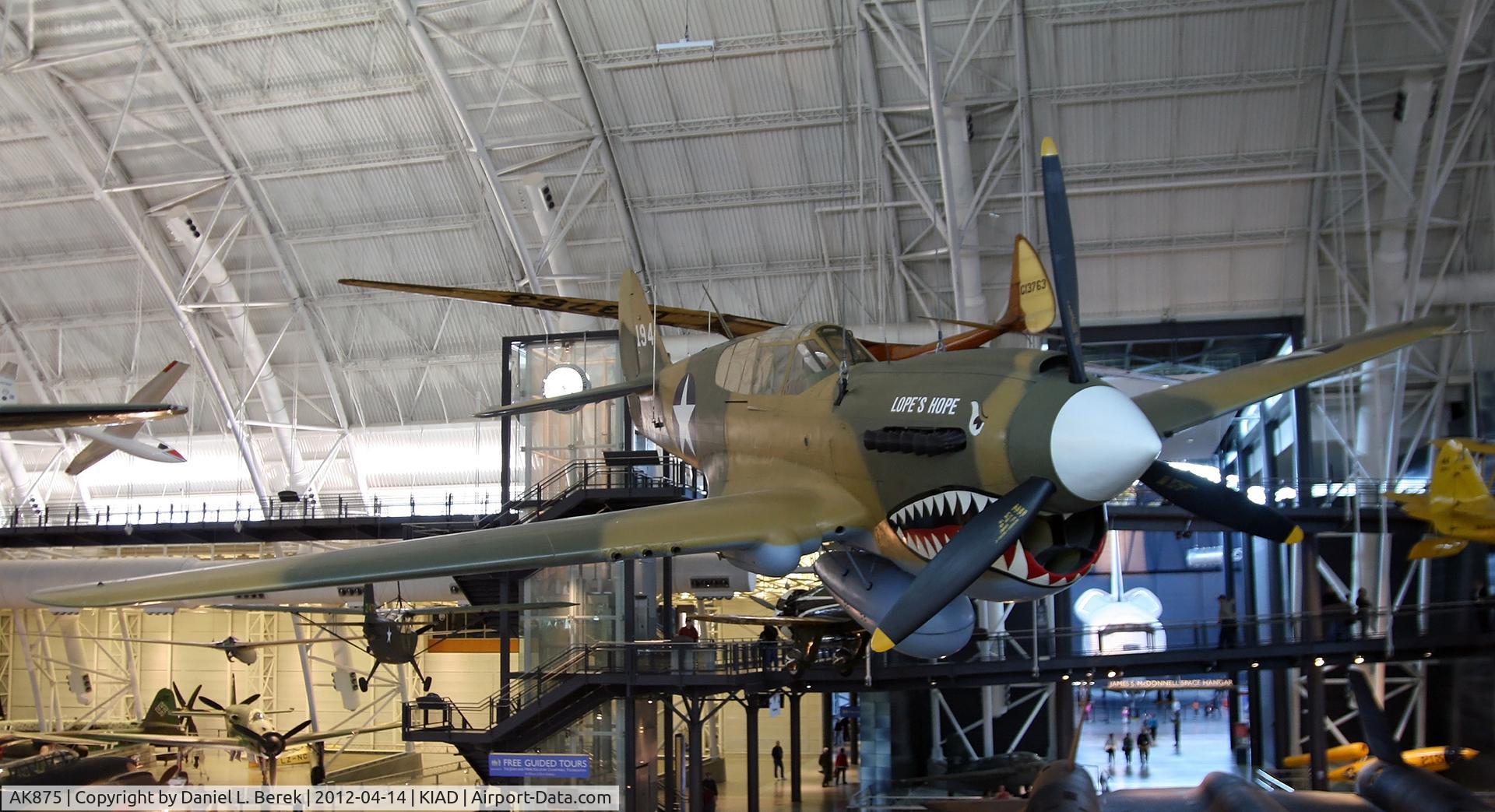 AK875, 1942 Curtiss P-40E Kittyhawk 1A C/N 15349, This beauty also serves as a 