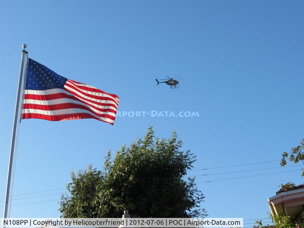 N108PP, 2008 MD Helicopters 369E C/N 0578E, Passing north of the house, past the flag
