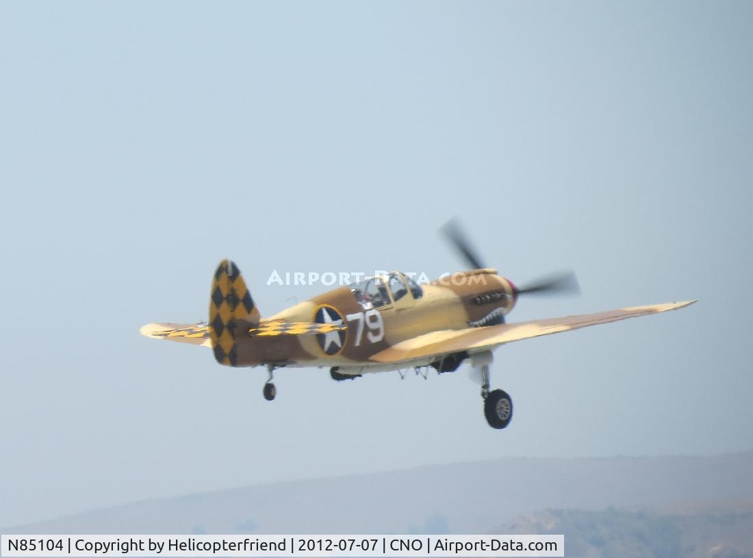 N85104, Curtiss P-40N-5CU Kittyhawk C/N 28954/F858, One gear up, one to go and climbing out