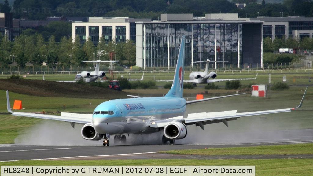 HL8248, 2012 Boeing 737-9B5ER C/N 37635, Arriving on a wet runway as KAL3907 for exhibition at Farnborough 2012