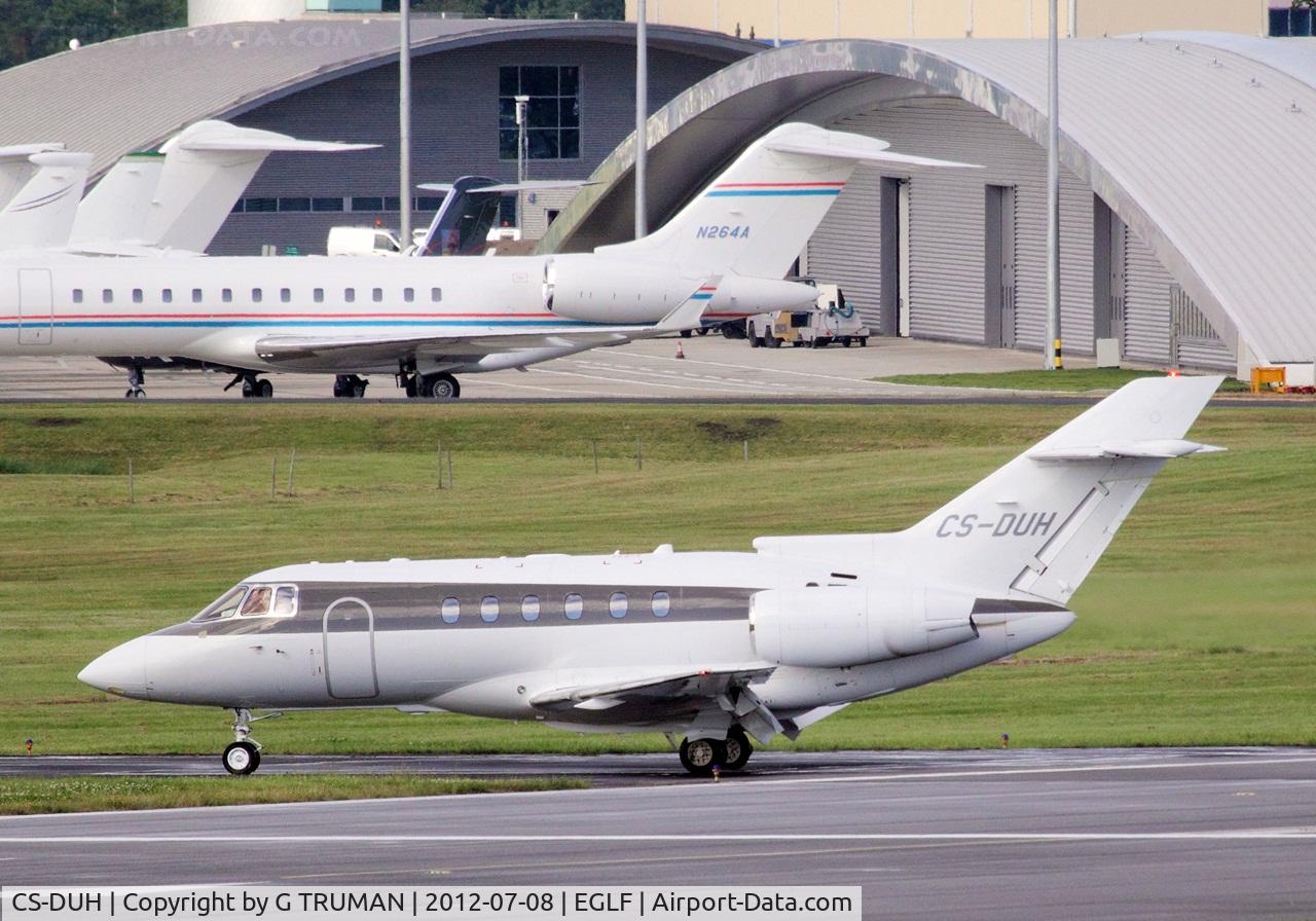 CS-DUH, 2009 Hawker Beechcraft 750 C/N HB-21, Arriving at a wet Farnborough