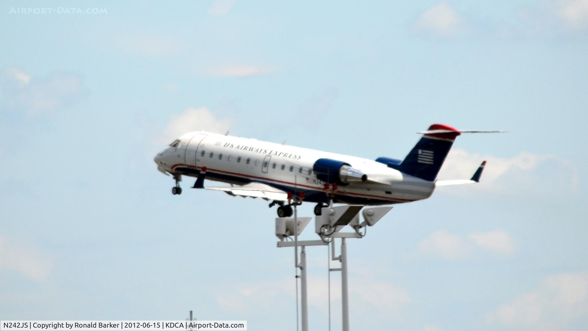 N242JS, 2004 Bombardier CRJ-200ER (CL-600-2B19) C/N 7911, Takeoff DCA