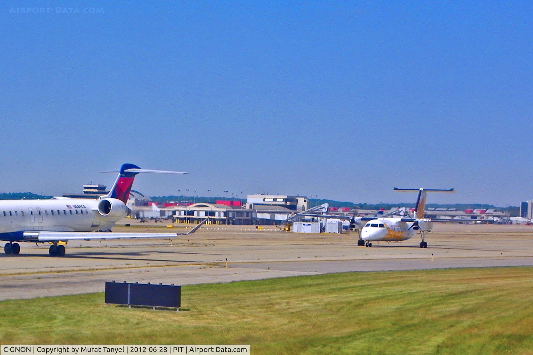 C-GNON, 1989 De Havilland Canada DHC-8-301 Dash 8 C/N 137, #3 to take off from PIT.