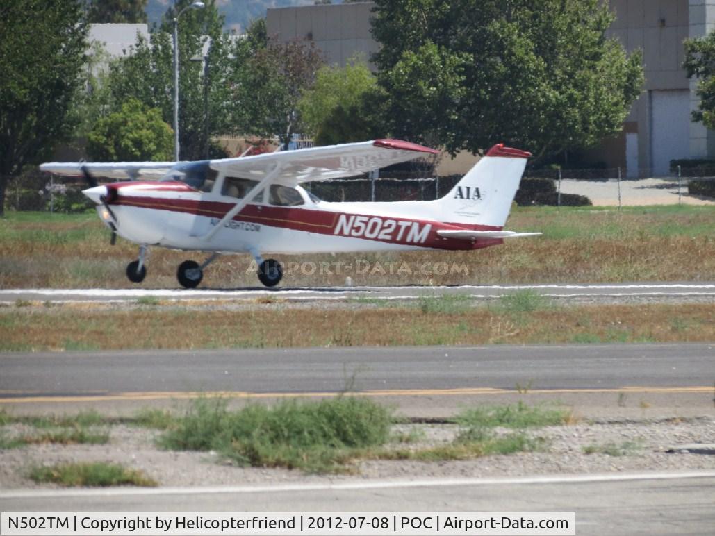N502TM, 1975 Cessna 172M C/N 17265893, Touching down on a gusty, warm day