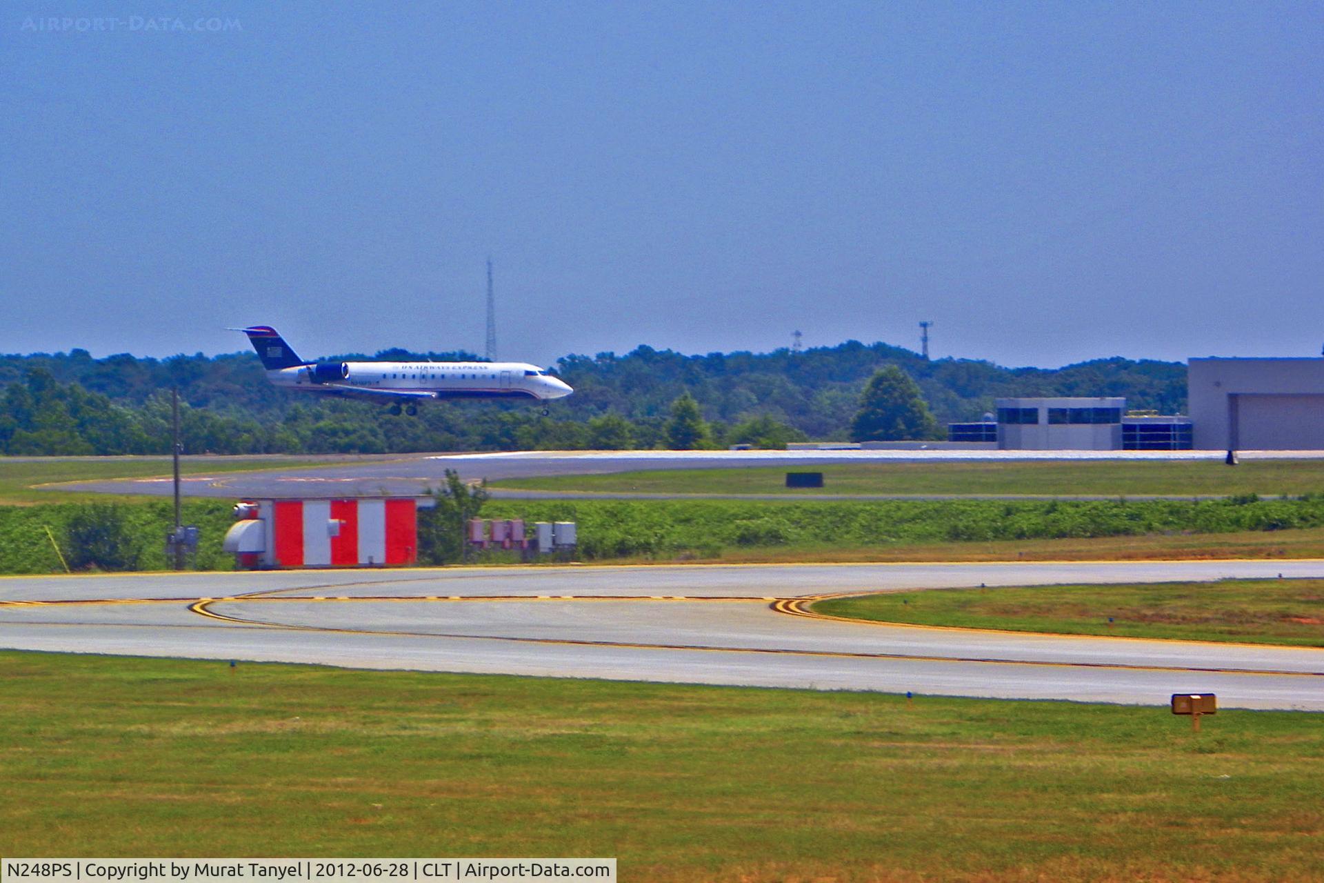 N248PS, 2004 Bombardier CRJ-200ER (CL-600-2B19) C/N 7925, Landing at CLT.
