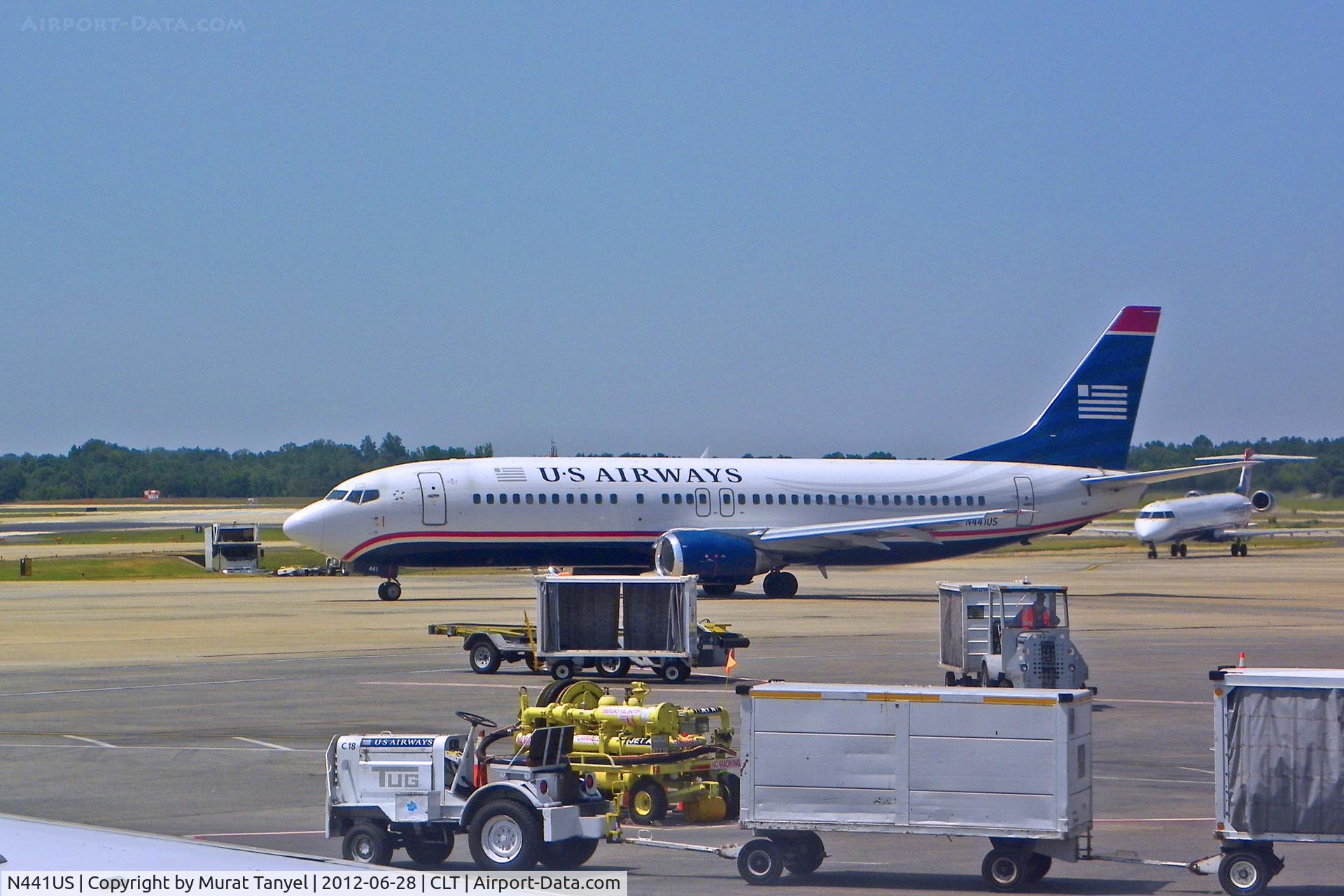 N441US, 1990 Boeing 737-4B7 C/N 24812, Taxiing at CLT.