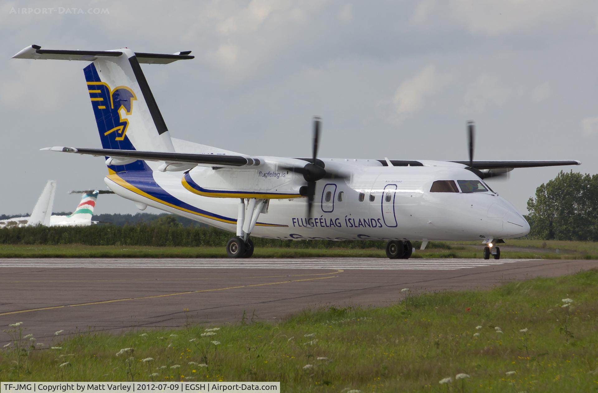 TF-JMG, 1996 De Havilland Canada DHC-8-202 Dash 8 C/N 445, About to depart EGSG after spray.
