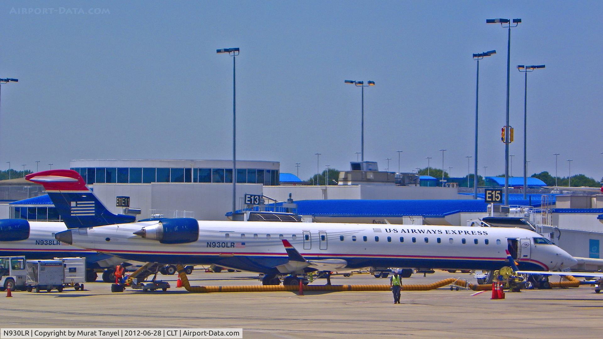 N930LR, 2005 Bombardier CRJ-900ER (CL-600-2D24) C/N 15030, At the gate at CLT