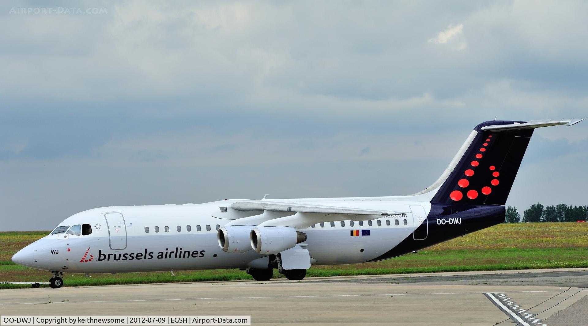 OO-DWJ, 1999 British Aerospace Avro 146-RJ100 C/N E3355, Towed from spray on a busy day 1.