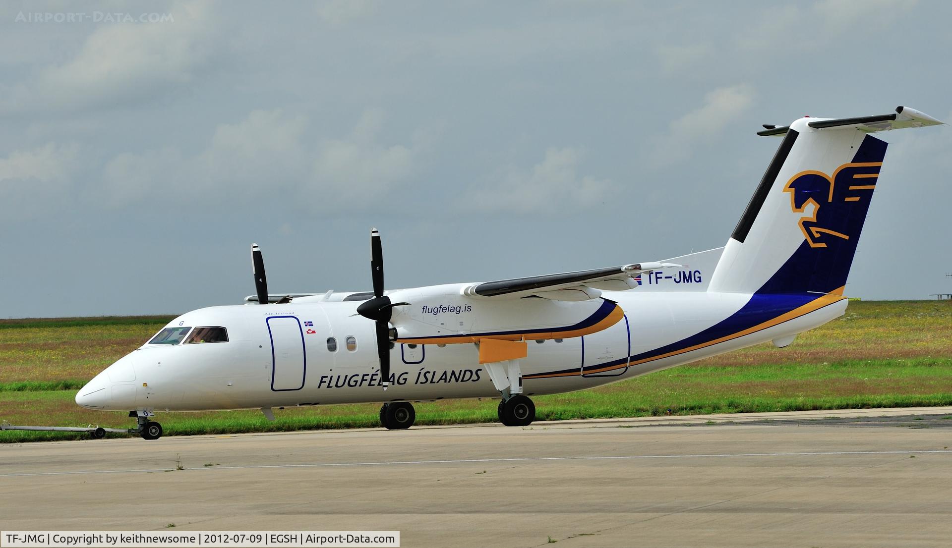 TF-JMG, 1996 De Havilland Canada DHC-8-202 Dash 8 C/N 445, Towed from spray on a busy day 2.