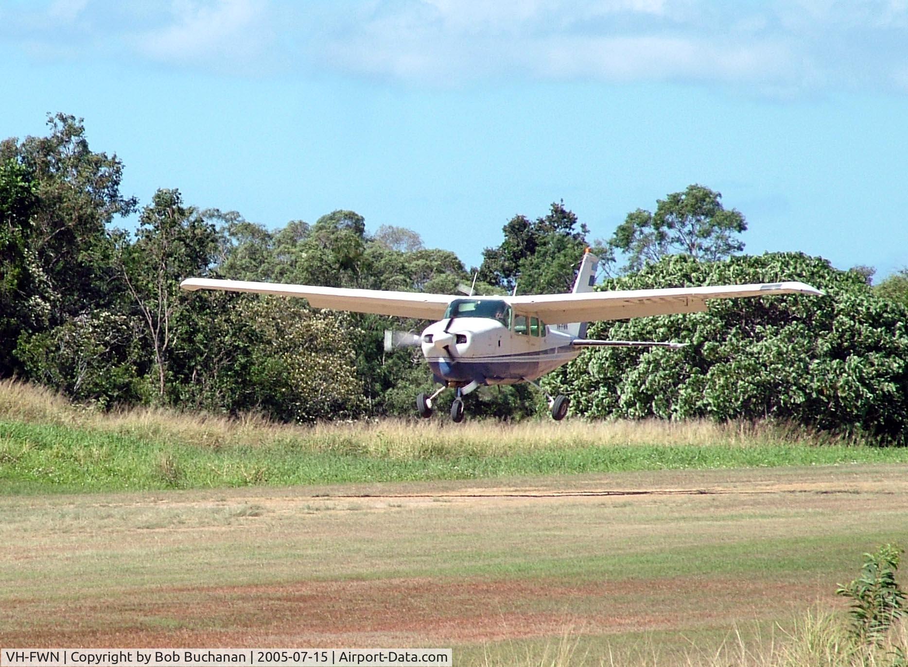 VH-FWN, 1967 Cessna 210H Centurion C/N 21058950, Short Final, Schute Harbour, Qld