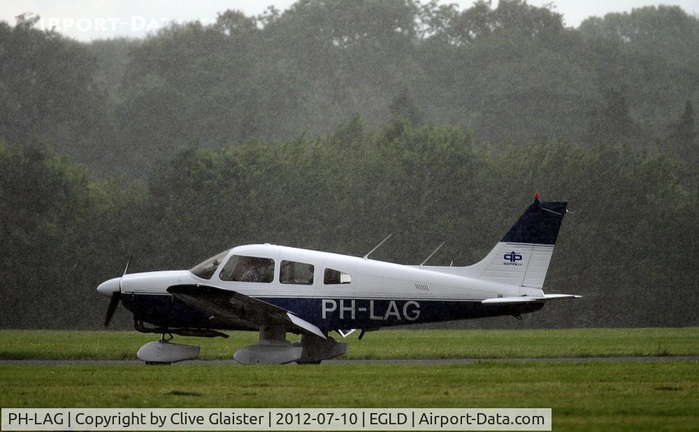 PH-LAG, Piper PA-28-181 Archer II C/N 28-8090296, Photo taken wile it was raining.