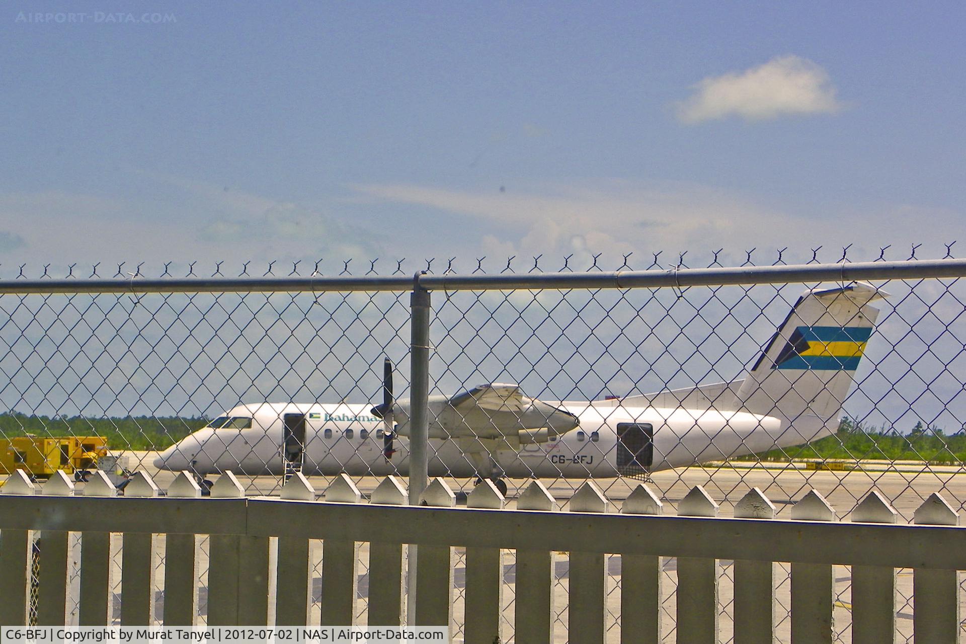 C6-BFJ, 1992 De Havilland Canada DHC-8-311 Dash 8 C/N 323, Behind bars at Nassau Intl