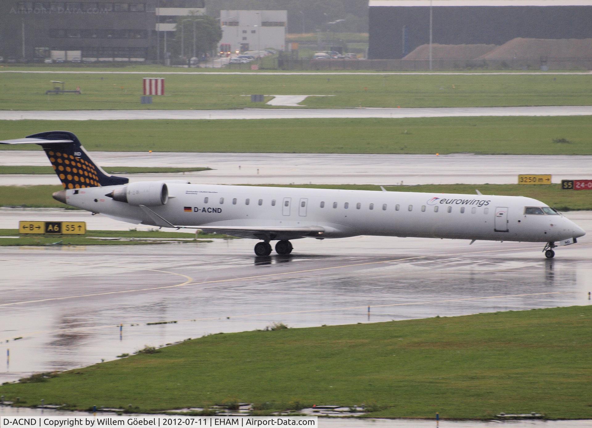 D-ACND, 2009 Bombardier CRJ-701 (CL-600-2C10) Regional Jet C/N 15238, Taxi to his gate of Schiphol Airport