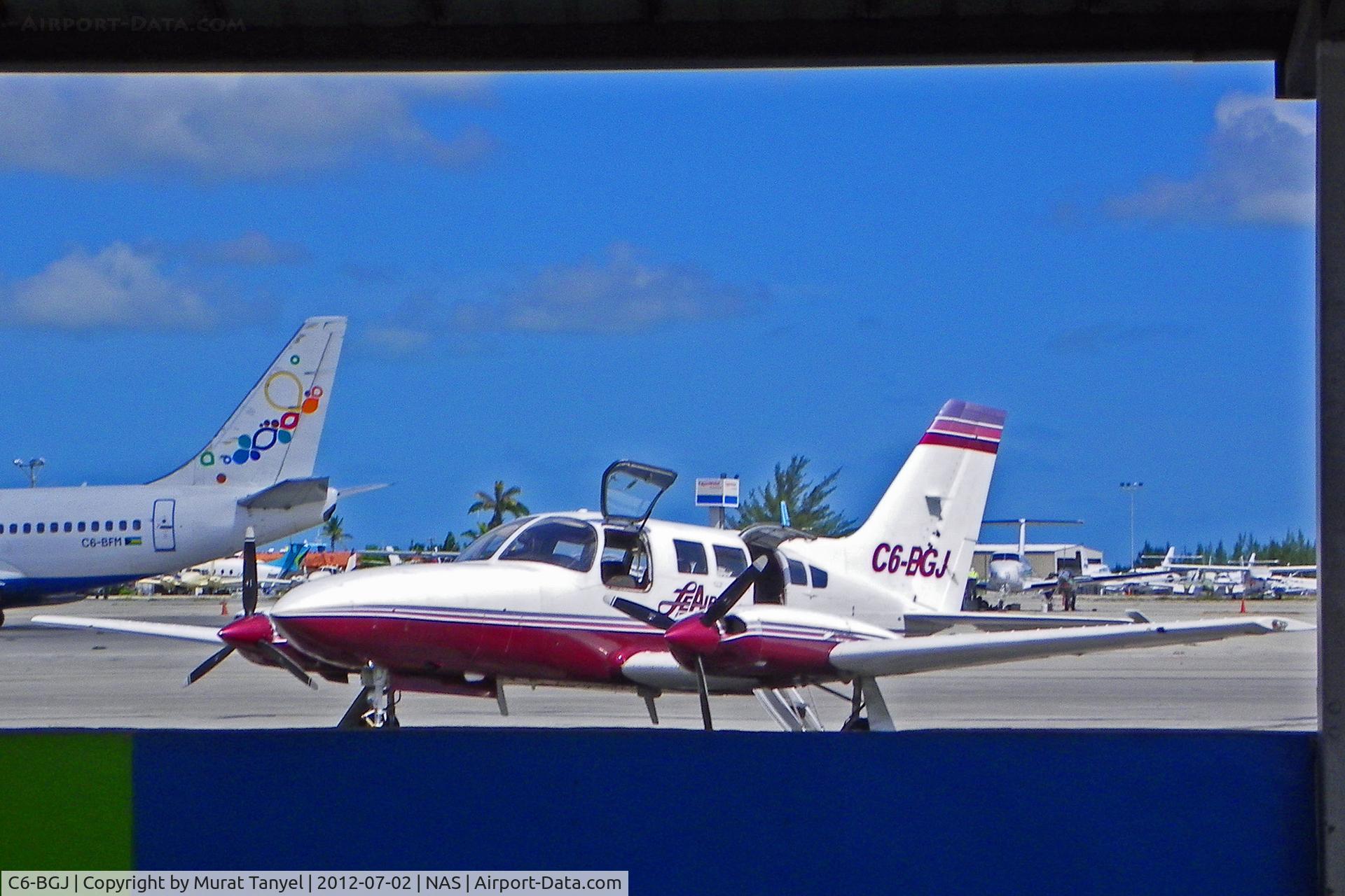 C6-BGJ, Cessna 402C C/N 402C-0106, Waiting on the tarmac at Nassau Intl
