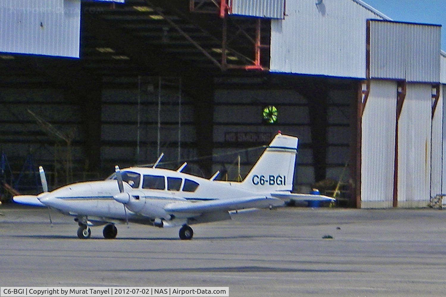 C6-BGI, 1968 Piper PA-23-250 Aztec C/N 24-4020, In front of the hangar