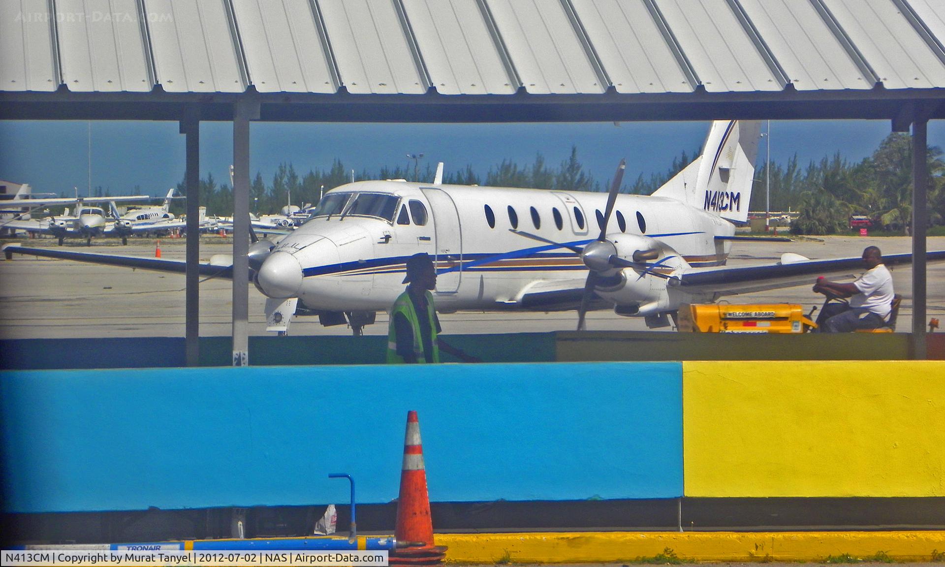 N413CM, 1988 Beech 1900C C/N UC-13, Parked at Nassau Intl