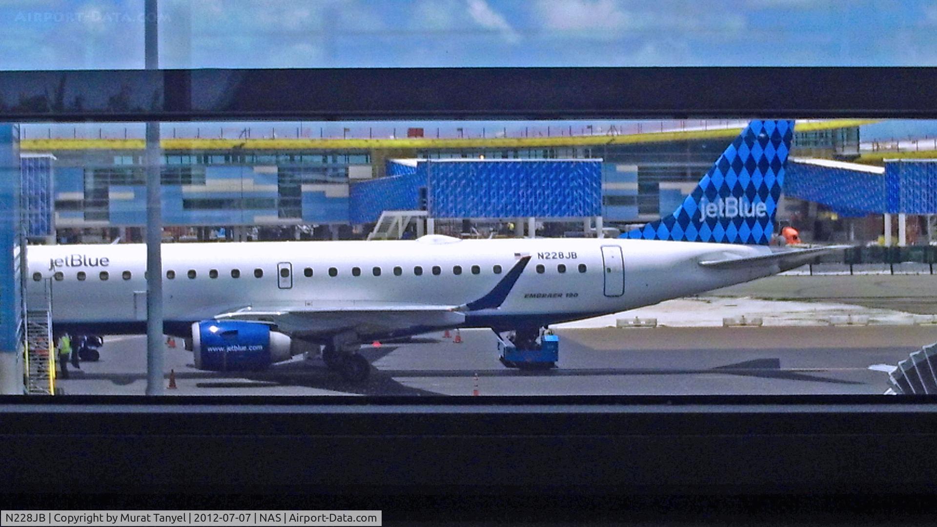 N228JB, 2006 Embraer 190AR (ERJ-190-100IGW) C/N 19000030, At the gate at NAS