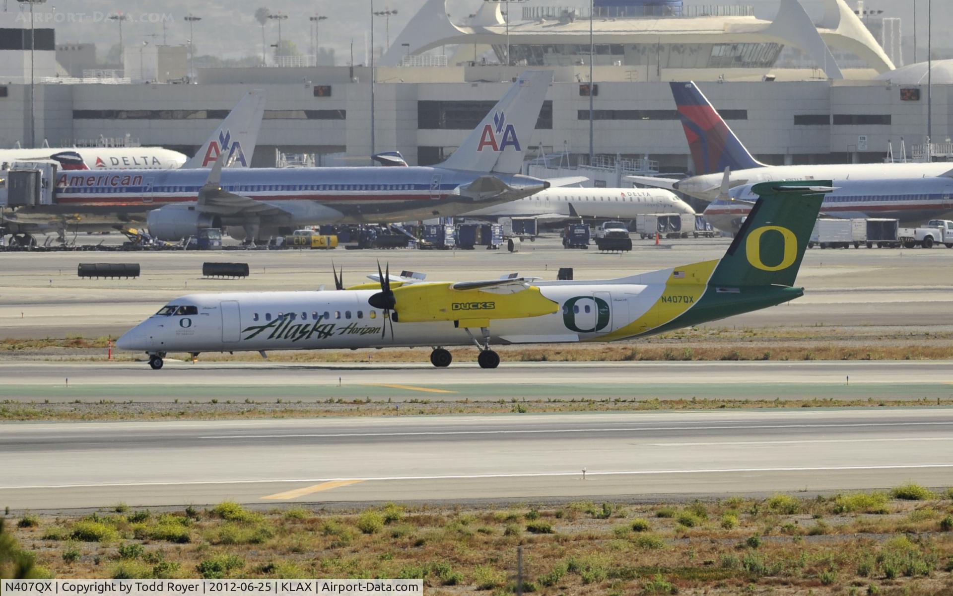 N407QX, 2001 Bombardier DHC-8-402 Dash 8 C/N 4049, Taxiing to gate after arriving at LAX on 25L