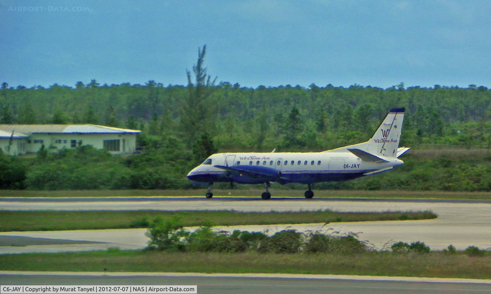 C6-JAY, 1988 Saab 340A C/N 340A-120, Coming to a stop after touch-down at NAS