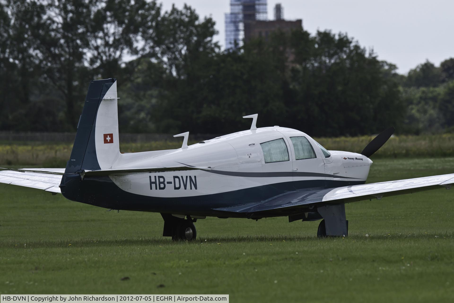 HB-DVN, 1965 Mooney M20E Super 21 C/N 807, Parked at Goodwood