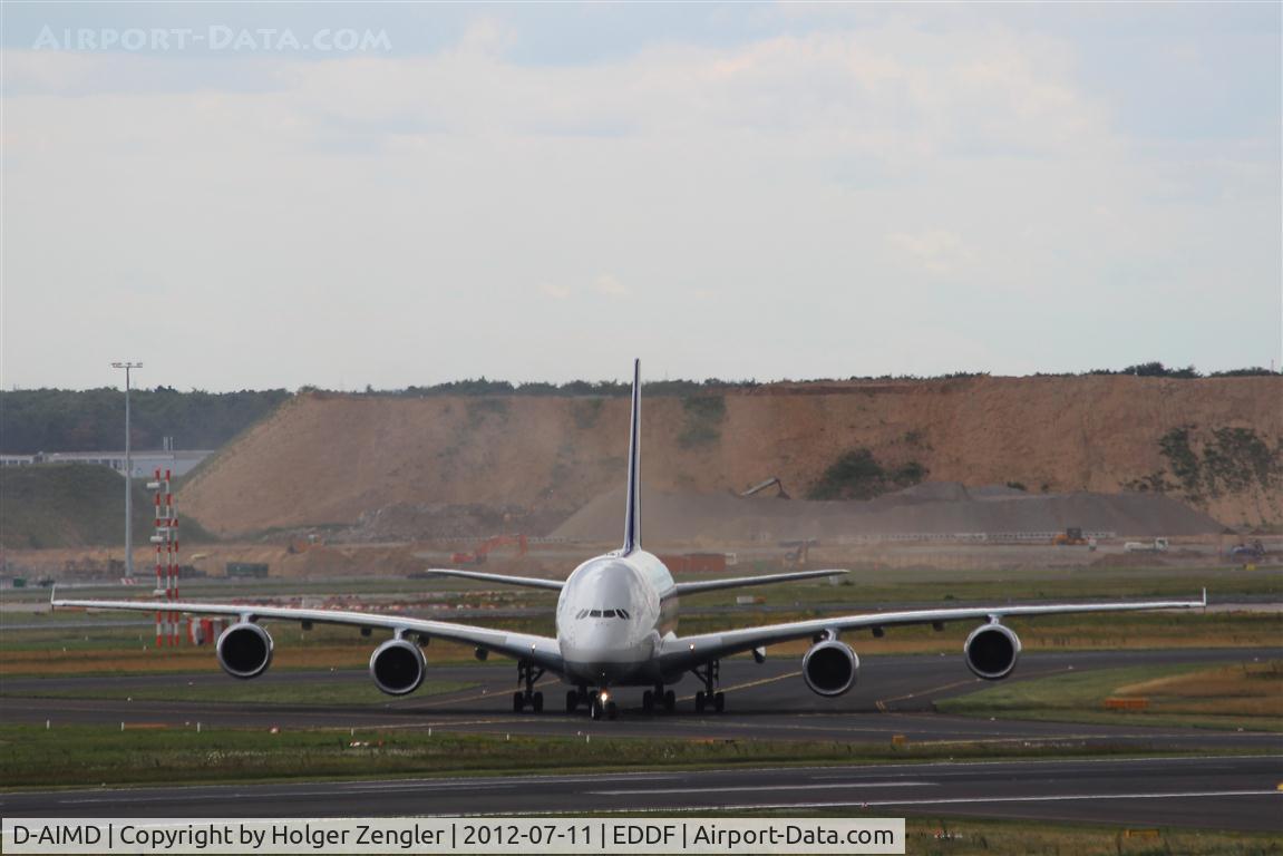 D-AIMD, 2010 Airbus A380-841 C/N 048, Taxiing to park position and crossing rwy 25C soon....