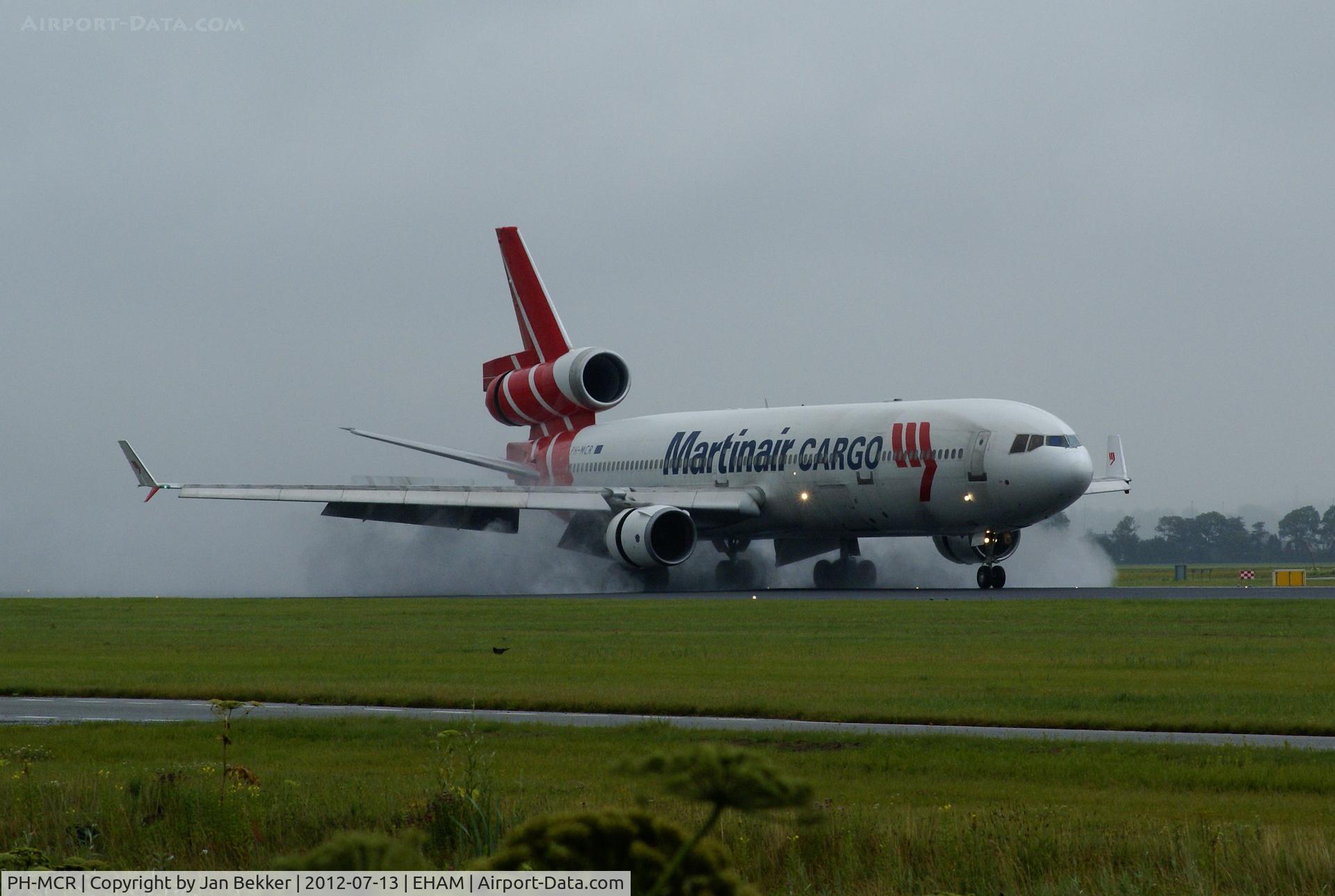 PH-MCR, 1995 McDonnell Douglas MD-11F C/N 48617, Landing in the rain on the 