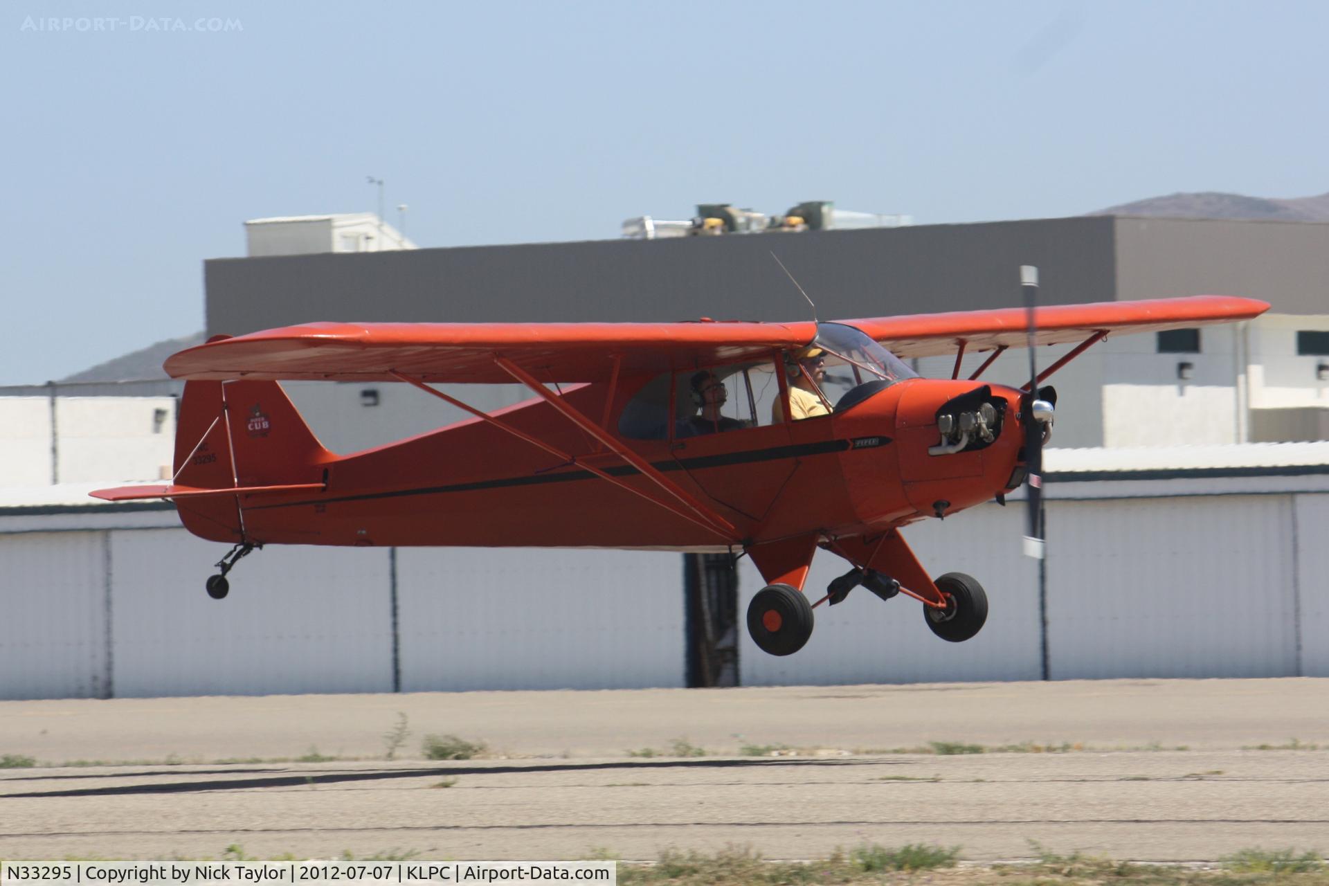 N33295, 1940 Piper J5A Cub Cruiser C/N 5485, Lompoc Piper Cub fly in 2012
