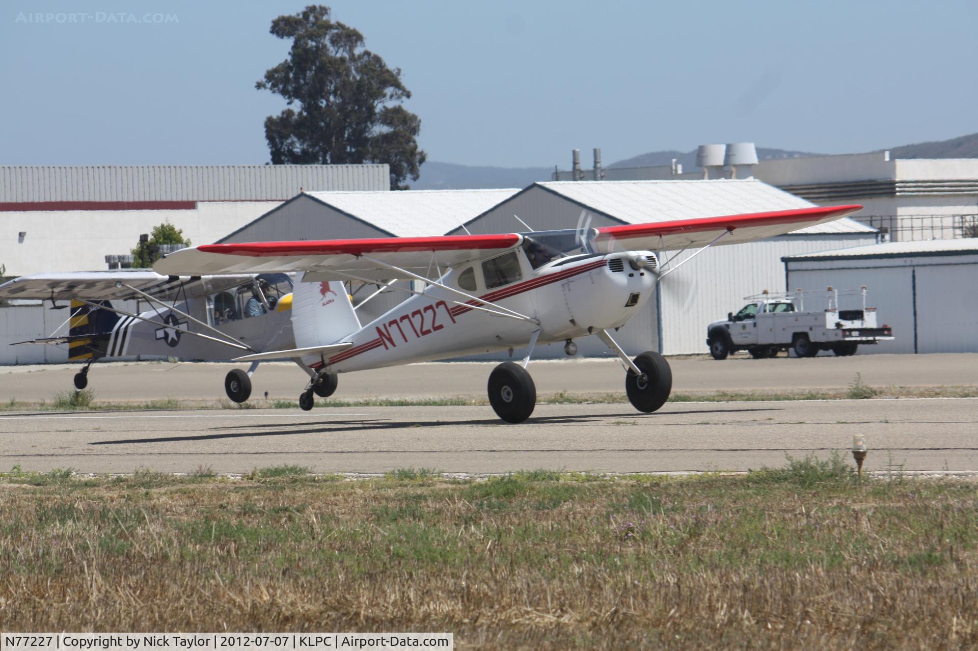 N77227, 1946 Cessna 140 C/N 11689, Departing with N424AJ