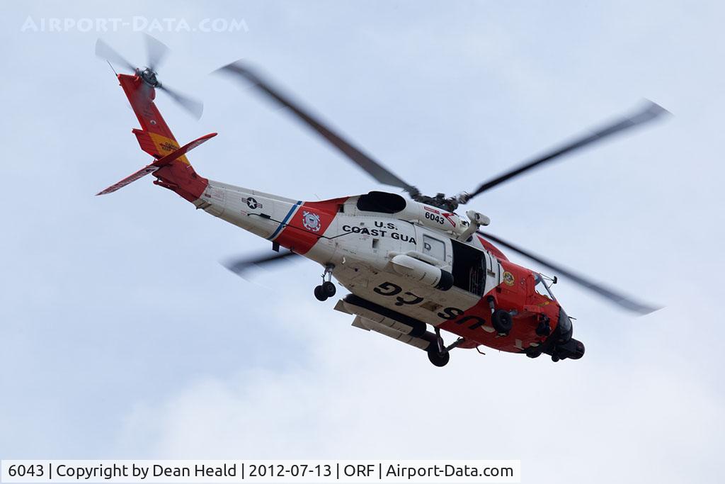 6043, 2004 Sikorsky MH-60T Jayhawk C/N 70.1576, US Coast Guard Sikorsky MH-60T Jayhawk 164097 scanning the Norfolk International Airport area prior to the arrival of President Barack Obama.