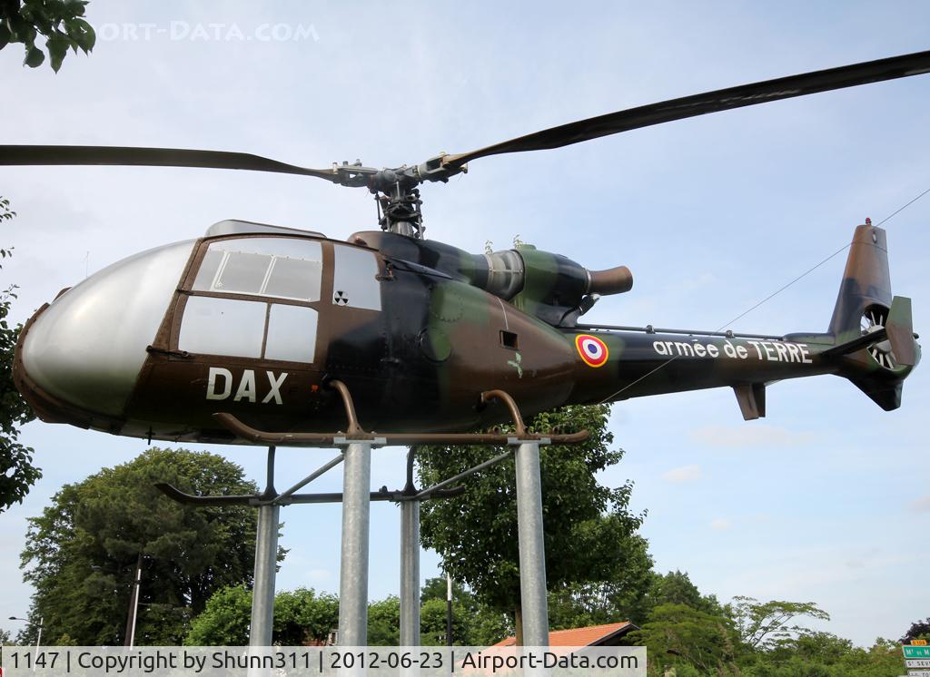 1147, Aérospatiale SA-341F Gazelle C/N 1147, Now mounted on pylons on a roundabout near Dax Air Base. Was inside the Base...