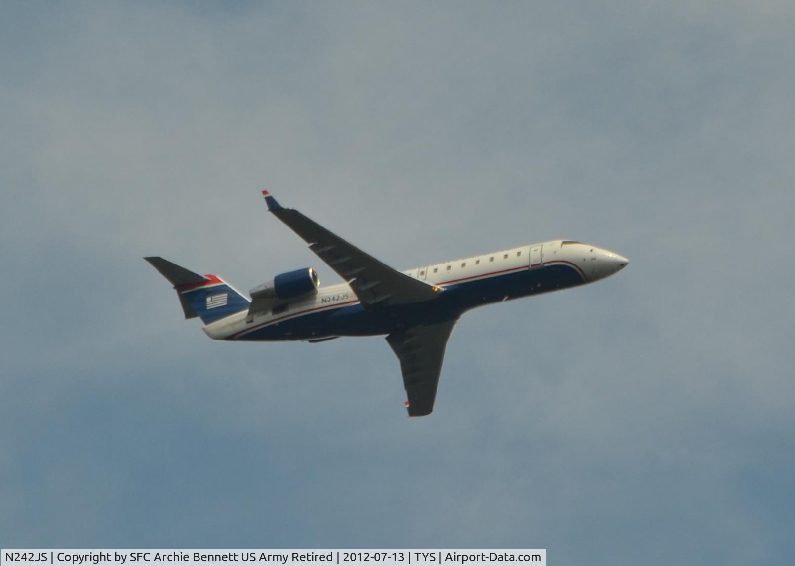 N242JS, 2004 Bombardier CRJ-200ER (CL-600-2B19) C/N 7911, At 5 miles out on the outer marker ILS for Runway 5R TYS  Knoxville, Tennessee.