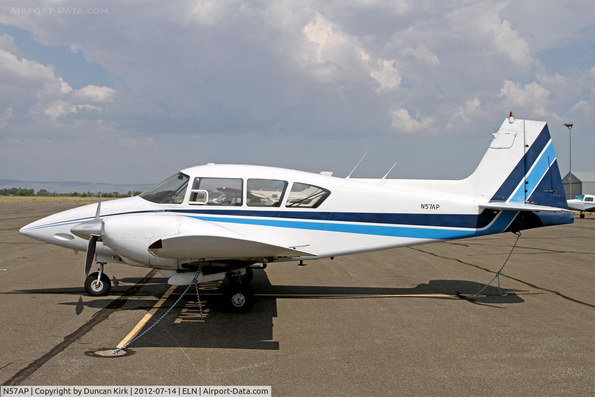N57AP, 1957 Piper PA-23-250 Aztec C/N 23-1110, Basking in the sun before impending thunderstorms