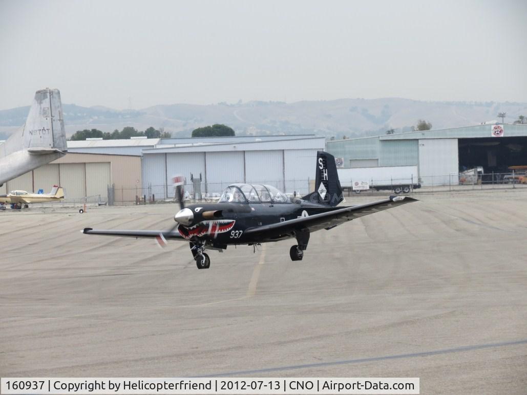 160937, Beech T-34C Turbo Mentor C/N GL-123, Taxiing out from between the hangers