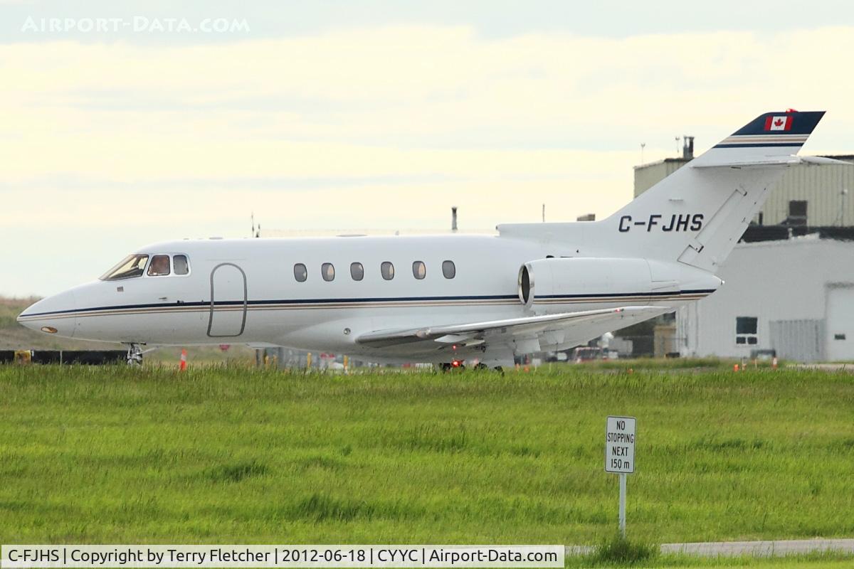C-FJHS, 1996 Raytheon Hawker 800XP C/N 258283, At Calgary