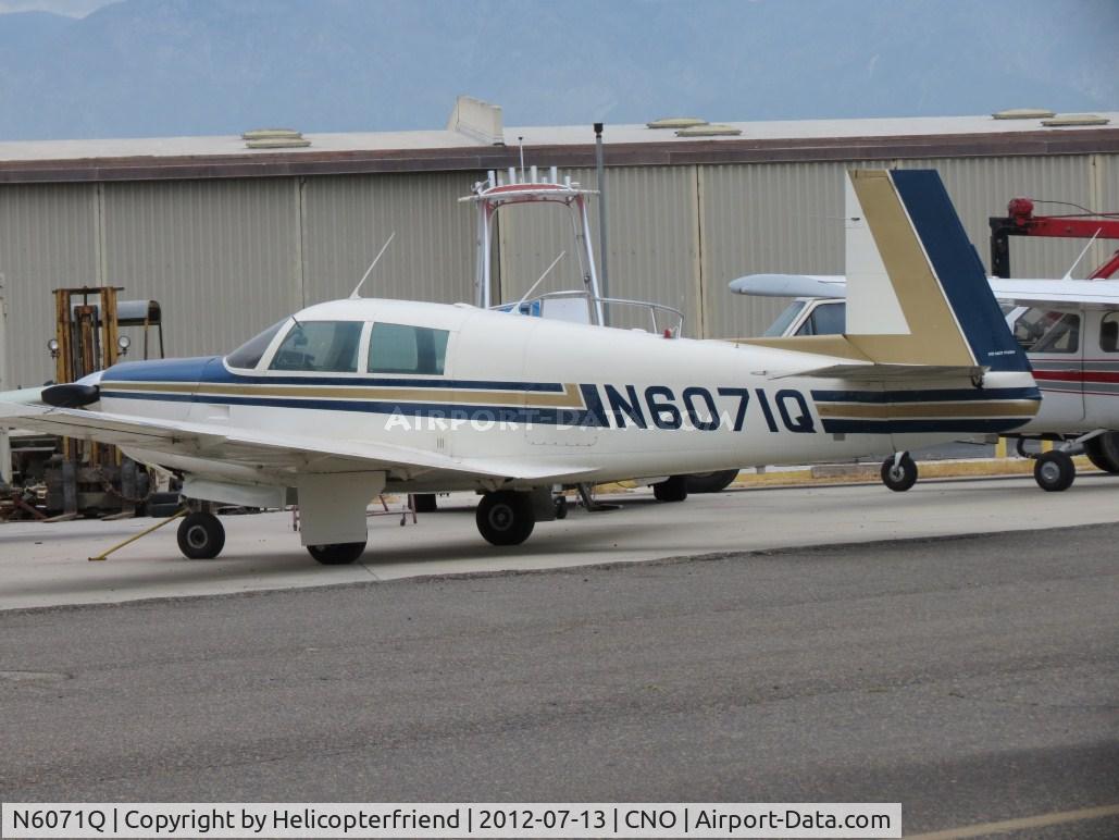 N6071Q, 1965 Mooney M20E C/N 900, Parked at a shop
