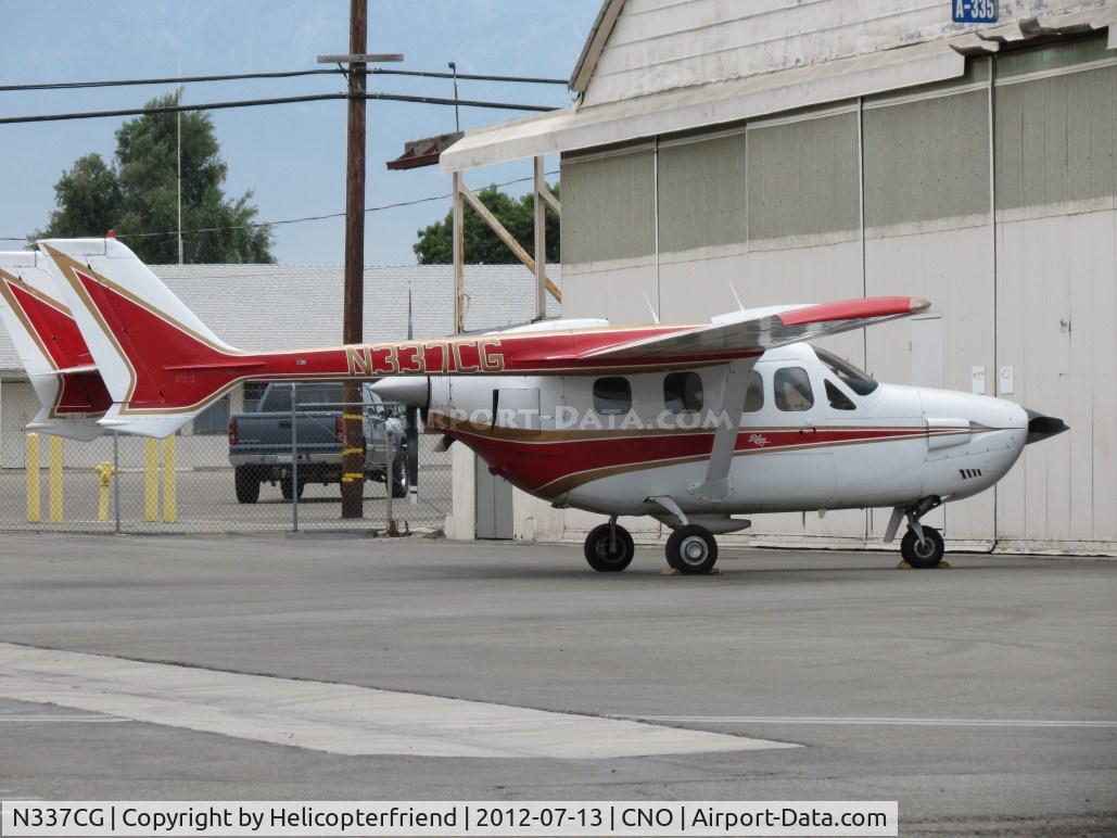 N337CG, 1973 Cessna T337G Turbo Super Skymaster C/N P3370143, Parked at a hanger